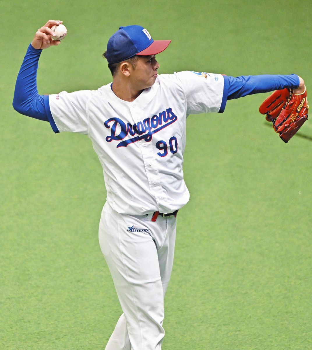 ネットスローで調整する松山