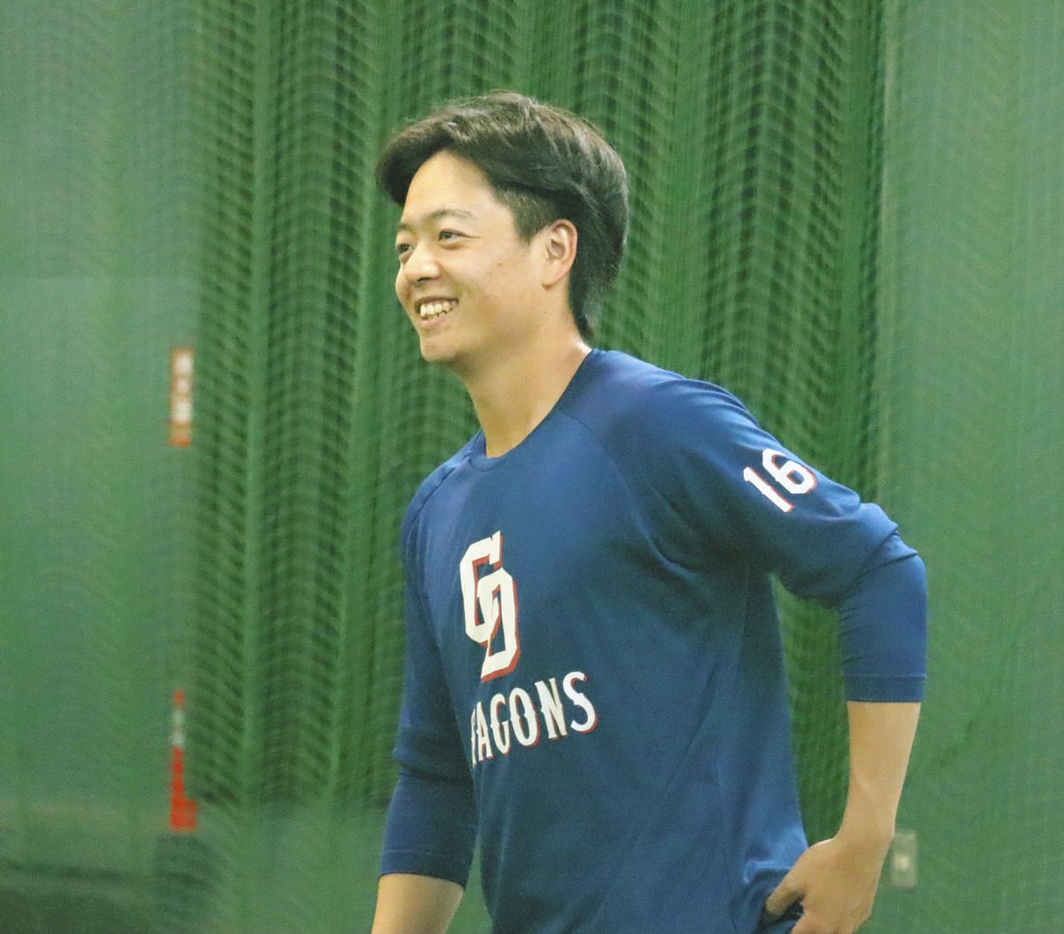 明るい表情で練習する桜井