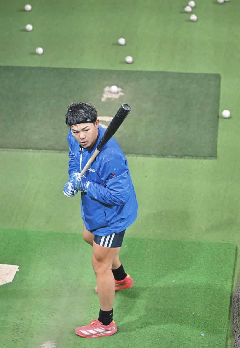 マシン打撃する高橋周